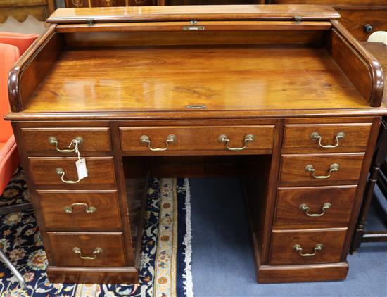 An early 20th century George III style mahogany roll top desk W.122cm